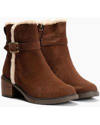 TOMS - Hailey Buckle Suede Dark Boots - Lyst