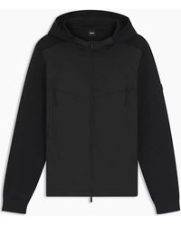 BOSS - Solid Patterned Hooded Ribbed Cuff Rain Jacket With Logo Badge - Lyst