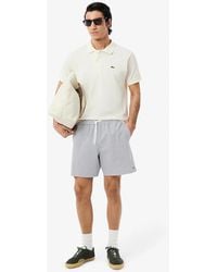 Lacoste - Mid Length Striped Textured Swim Trunks - Lyst