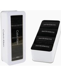 Calvin Klein - 4-Pack Allover Logo Socks Gift Tin - Lyst
