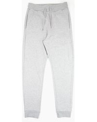 Love Moschino - Embossed Peace Logo Tracksuit Pants - Lyst