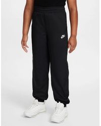 Nike - Solid Patterned Track Woven Pants - Lyst