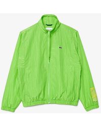 Lacoste - Solid Patterned Rain Jacket With Crocodile Logo - Lyst