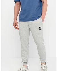 New Balance - Hoops Fundamentals Sweatpants - Lyst