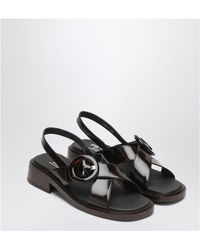 Prada - Brushed Leather Sandals With A Burnt Color Buckle - Lyst
