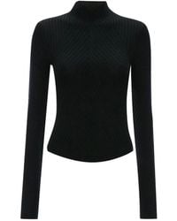 Victoria Beckham - Tactile Ribbed Merino Wool Sweater With V-Shaped High-Neck And Curved V-Shape Hemline - Lyst