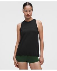 lululemon - – Swiftly Relaxed Tank Top Hip Length Logo – – Size 4 - Lyst