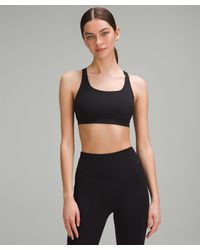 lululemon - Energy Sports Bra Medium Support - Lyst