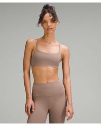 lululemon - – Wunder Train Strappy Racer Sports Bra Ribbed Light Support, A/B Cup – – - Lyst