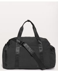 grey north face bolsa