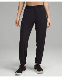 lululemon - Tearaway Mid-rise Track Pants - Color Black - Size 0 - Lyst