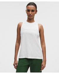 lululemon - – Swiftly Relaxed Tank Top Hip Length Logo – – Size 4 - Lyst