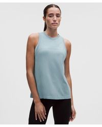 lululemon - – Swiftly Relaxed Tank Top Hip Length Logo – – Size 6 - Lyst
