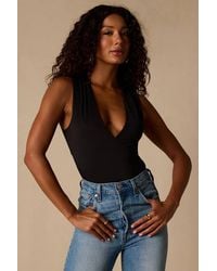 Lulus - Emerson Slinky Knit Cross-Back Bodysuit - Lyst
