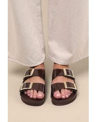 Madden Girl - Bodiee Dark Patent Buckle Slide Sandals - Lyst