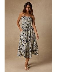 Lulus - Indie And Ivory Boho Print Smocked Midi Dress - Lyst