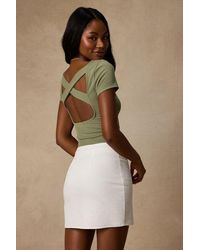 Lulus - Reese Ribbed Knit Cross-Back Bodysuit - Lyst