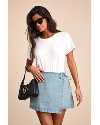 Lulus - Eileen Light Wash Denim Faux-Wrap Mini Skirt - Lyst