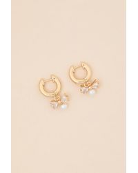 Lulus - Vianna Rhinestone Bow Huggie Hoop Earrings - Lyst