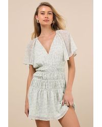 Lulus - Chrislyn Floral Flutter Sleeve Mini Dress - Lyst