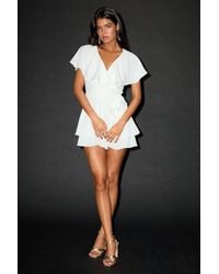 Lulus - Aldrin Ruffled Backless Wrap Skort Romper - Lyst