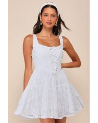 Rare London - Truly Flawless Lace Sleeveless Bow Bustier Mini Dress - Lyst