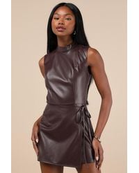 Lulus - Flawless Edge Dark Vegan Leather Wrap Skort Romper - Lyst