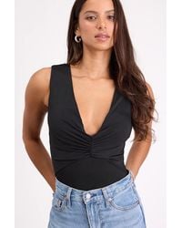 Lulus - Balyn Slinky Knit Cutout Bodysuit - Lyst
