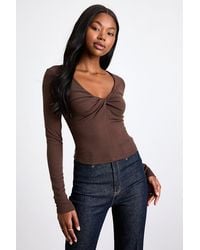 Lulus - Firona Jersey Knit Twist-Front Long Sleeve Top - Lyst