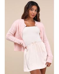 Lulus - Delicate Aesthetic Cream Satin Bow Mini Skirt - Lyst