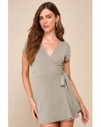 Lulus - Casual Darling Sage Faux Wrap Short Sleeve Skort Romper - Lyst