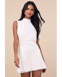 black mini dress gold buttons Timeless Treasure Black Wrapped Gold Button Detail Mini Dress