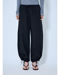 TOTEME - Drawstring Cotton Trousers - Lyst