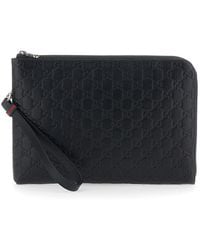 Gucci - 'Emblem' Clutch Bag With All-Over Embossed Gg Logo - Lyst