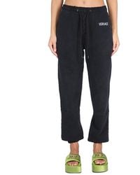Versace - Jogging Pants With Logo - Lyst