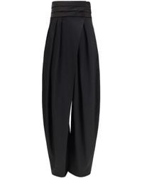Alaïa - Alaïa Rounded Tuxedo Wool Pants - Lyst