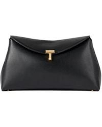 TOTEME - T-Lock Leather Clutch Bag - Lyst
