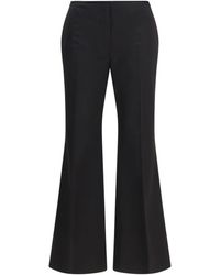 TOTEME - Pants Kick Flare Raw-Edge Cotton Trousers - Lyst