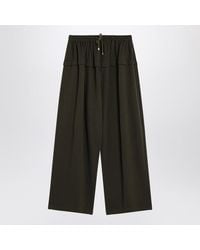 Alaïa - Peplum Trousers - Lyst
