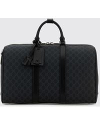 Gucci - Gg Supreme Duffle Bag With Leather Handles And Padlock - Lyst