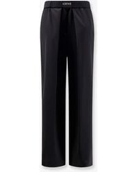 Loewe - Wool Trousers With Logo Detail - Lyst