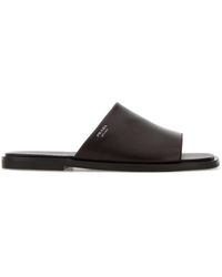 Prada - Dark Leather Slippers - Lyst