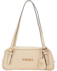 Versace - 'Tag Bowling' Shoulder Bag With Metallic Logo Lettering And Medusa Head Pendant - Lyst