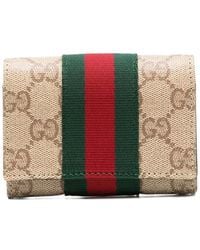 Gucci - Neutrals Wallets & Purses - Lyst
