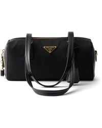 Prada - Re-Nylon And Leather Medium Top-Handle Bag With Padlock - Lyst