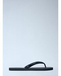 Prada - Logo-Embossed Leather Flip-Flop Sandals - Lyst