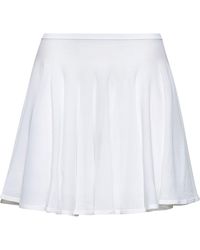 Alaïa - Fine Knit Skater Mini Skirt - Lyst