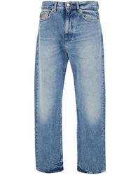 Versace - Jeans With Back Logo Patch And Faded Effect - Lyst