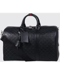 Gucci - Gg Emblem Leather Duffle Bag With Embossed Gg Monogram - Lyst