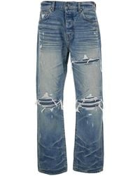 Amiri - Jeans With Ripped Details On The Front And Logo Patch On The Rear - Lyst
